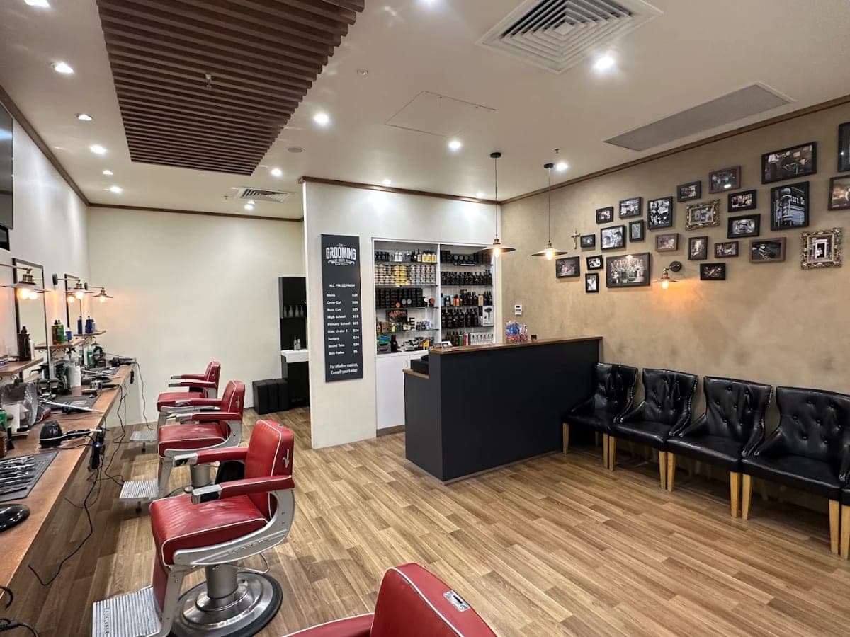 The Grooming Room Barbershop interior - Kellyville Interior of The Grooming Room Barbershop in Kellyville showing barber chairs, reception counter, and waiting area
