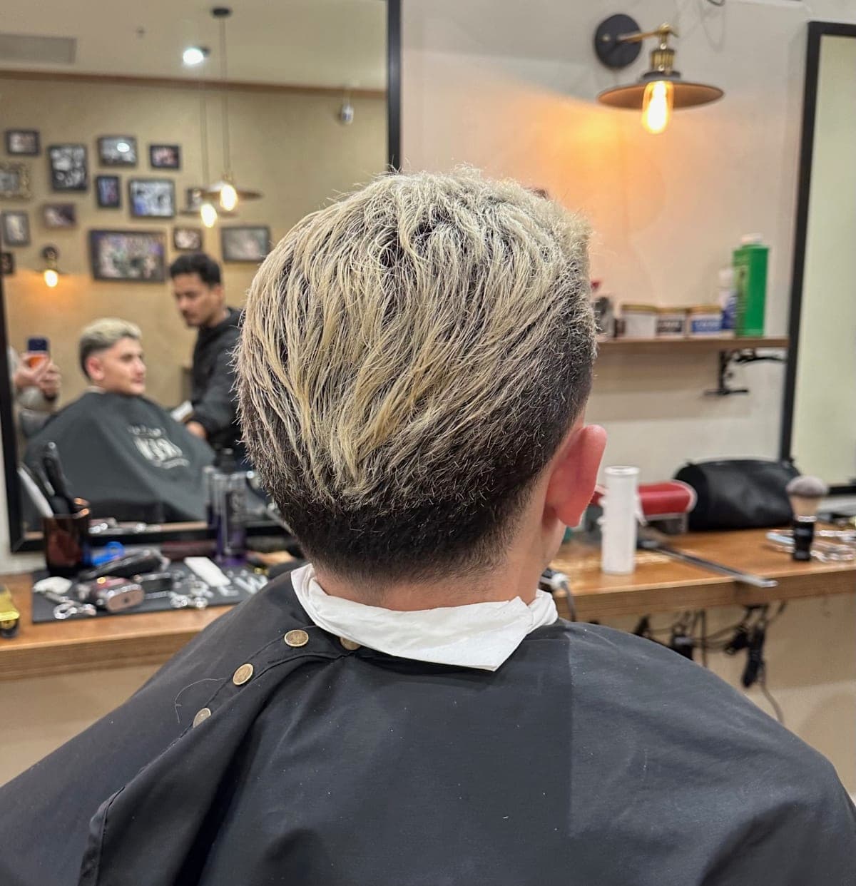 Clean fade haircut result - Kellyville barber Clean fade haircut with coloured top finished at The Grooming Room Barbershop in Kellyville