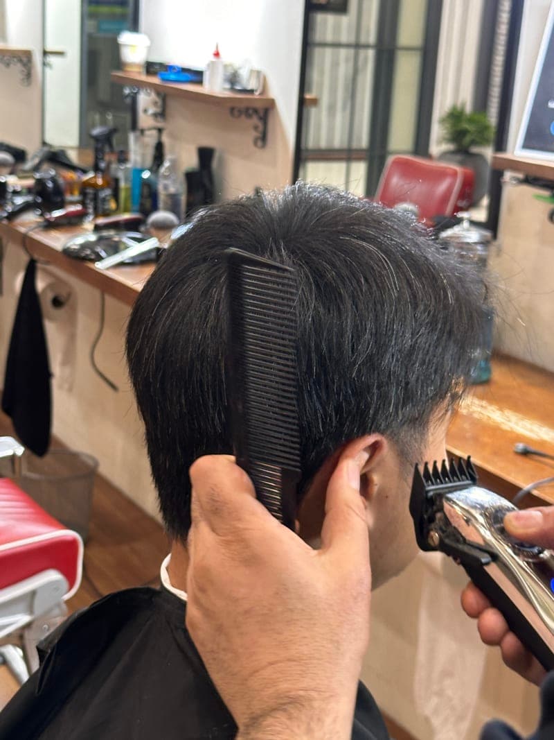 Men's Haircut – Kellyville Barbershop Men's haircut in progress at The Grooming Room Barbershop