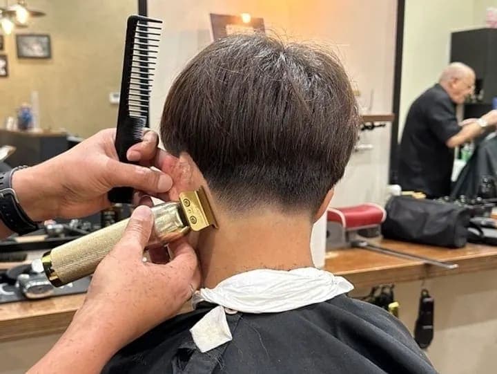 Taper Fade Haircut Taper fade haircut with clean edges and precise finish