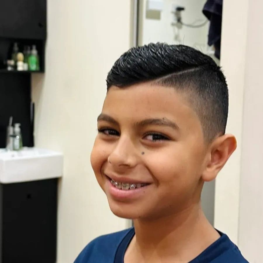 Children's haircut at The Grooming Room Barbershop Happy child after a fresh haircut at The Grooming Room Barbershop in Kellyville
